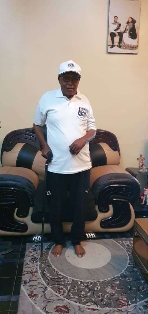 Shimelis with souvenirs